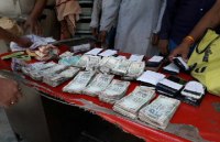 Police arrest 28 people caught gambling,