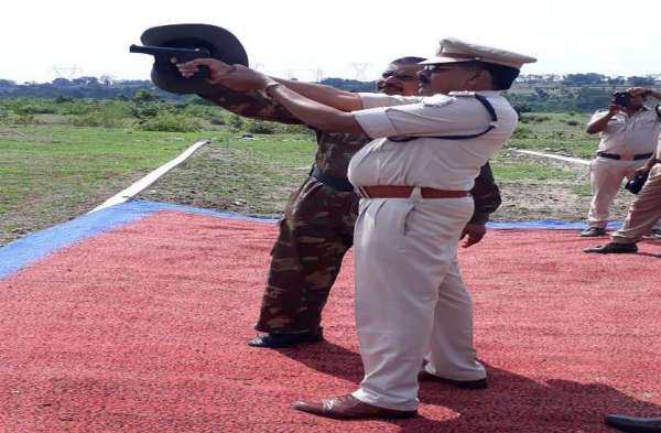 Prison officer, guards gun pointed out