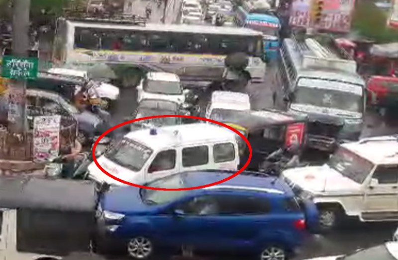 Ambulance trapped in traffic