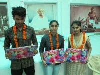 students Happy after getting laptop in prize