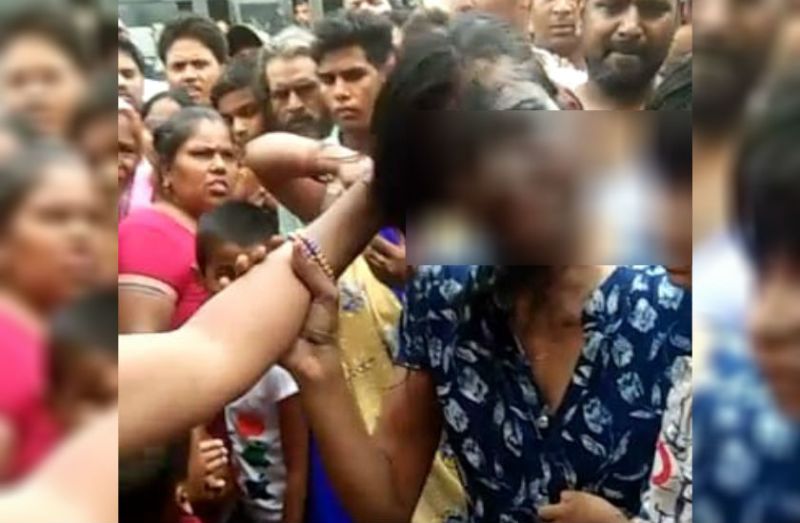 Woman Beaten by Public