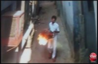 man attack on woman with buring cylender