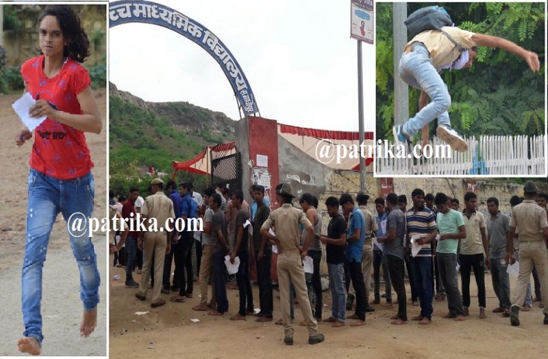 ट्रेन के आगे से पटरी पार करते अभ्यर्थी