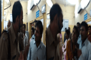 Bank Security guard beaten account holder employee 