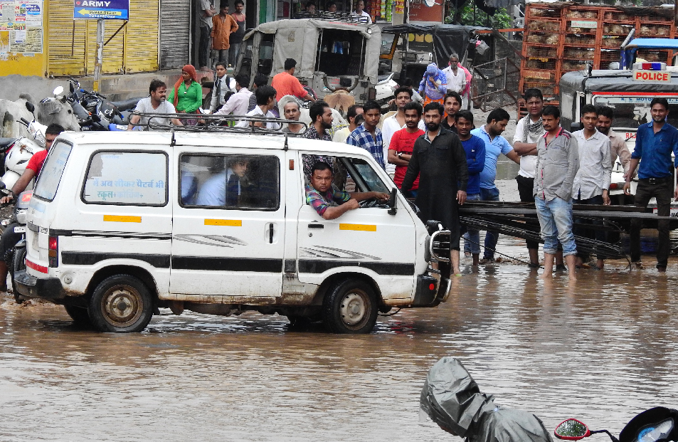 Road built tunnel, people stopped vehicles