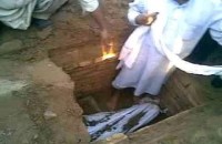 a rotten graveyard with one musk fragrant grave of a girl