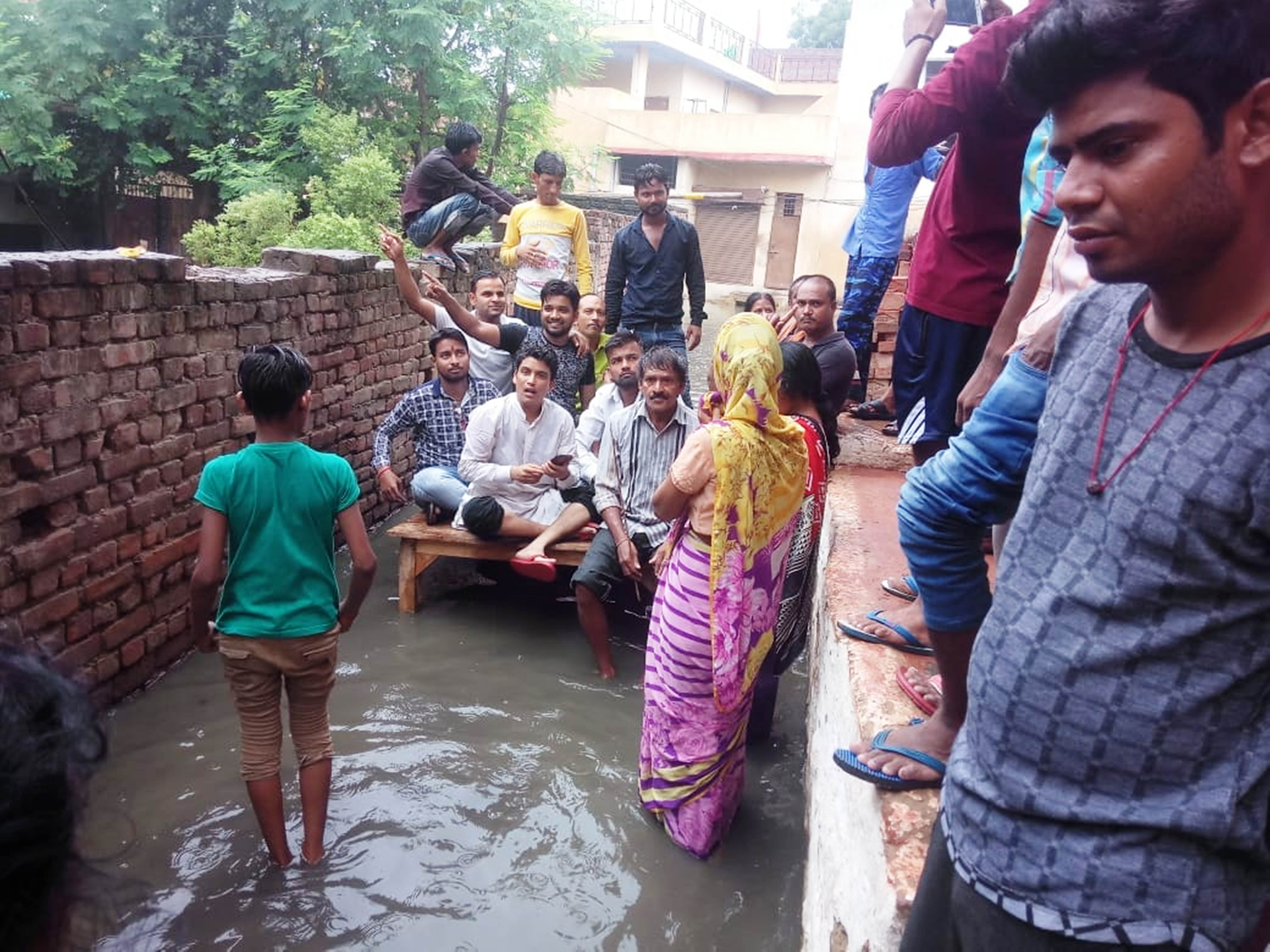an angry irritated over water flood in hostage to bjp councilor