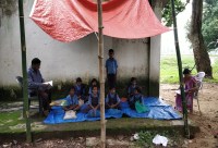 Class under the tarpaulin
