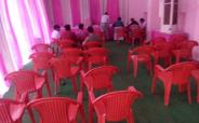 Chairs lying vacant in camp
