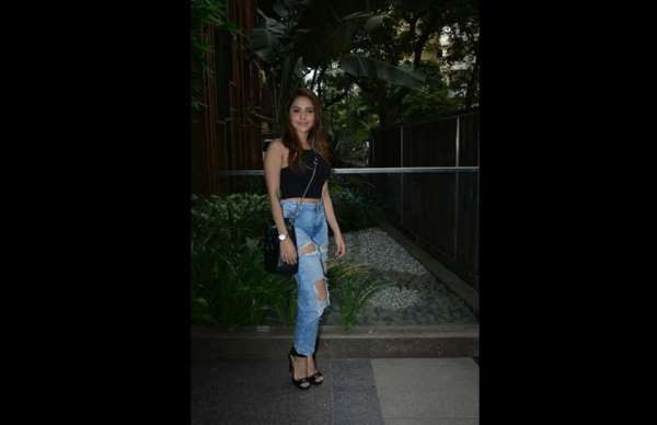 nushrat bharucha in black top and ripped jeans latest photos