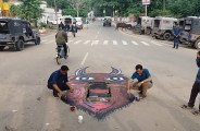 unique experiment in Alwar where pot holes painted in devil picture