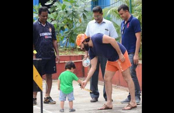 taimur ali khan playing badminton with saif ali khan photos