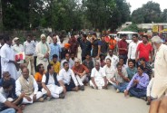 Leader of opposition sat on road