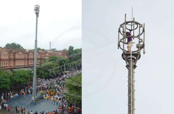 man climbed over mobile tower