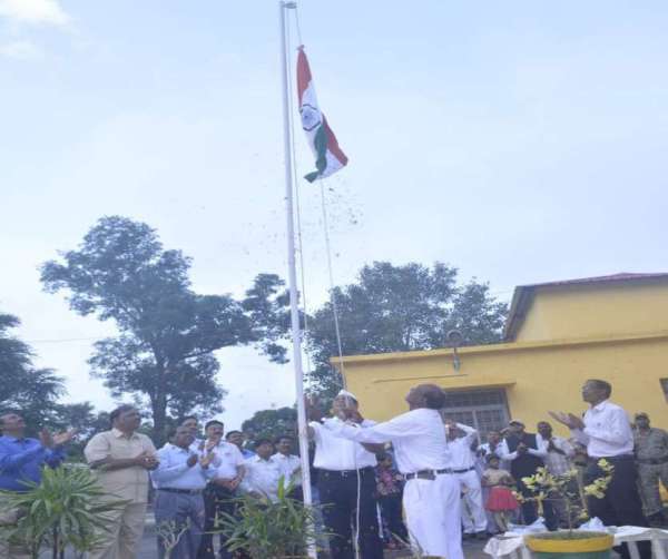 Commissioner hoisted the flag