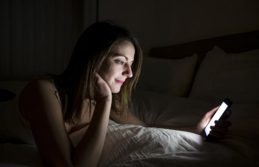 using smartphone at night 