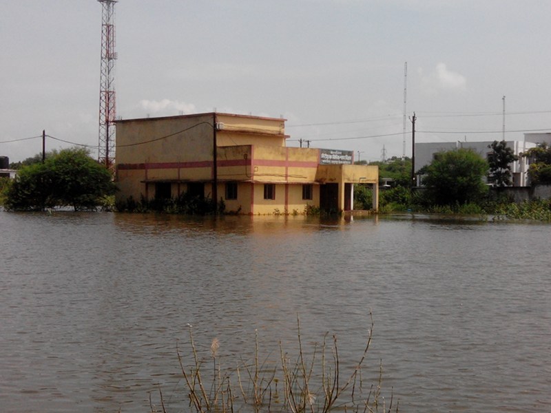 What is this? ... two government offices submerged by rain: waterfall