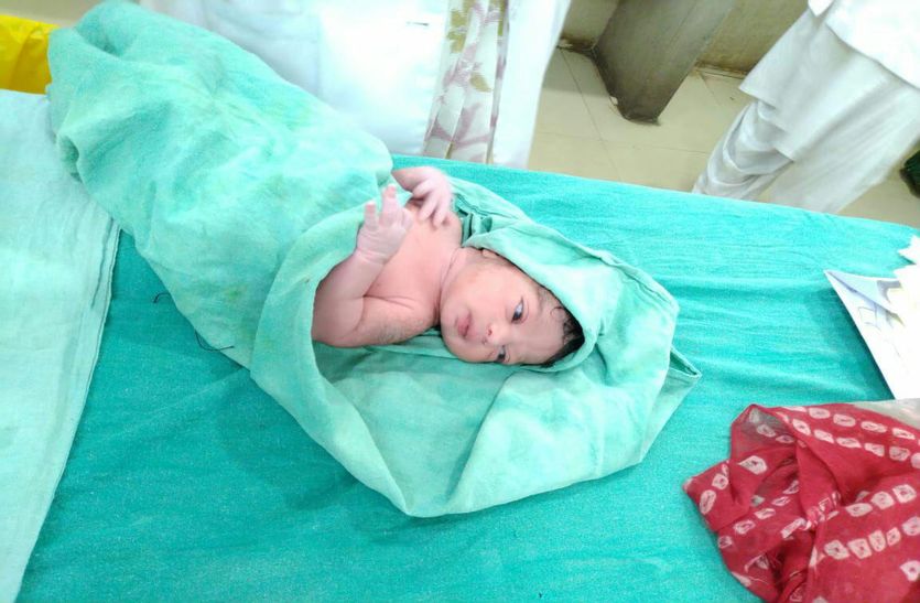 After all, what happened in hospital baby was born near statue gandhi