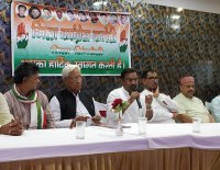 Chief Minister is drawing his photo on the working card