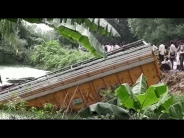 two truck going to nepal in the pond after being uncontrolled