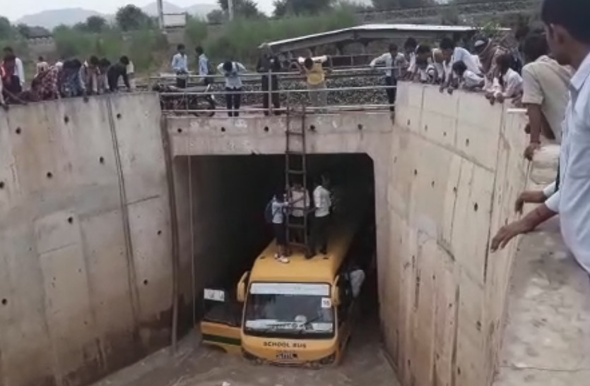 bus stuck in underpass