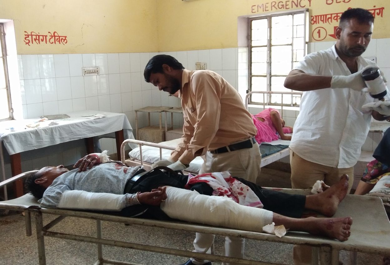 Three injured including mother-son riding bike over collision of bull