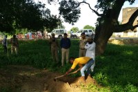 Dead Body Removed from Grave