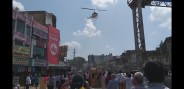 Helicopter blossoming flowers on ascetic in bhilwara
