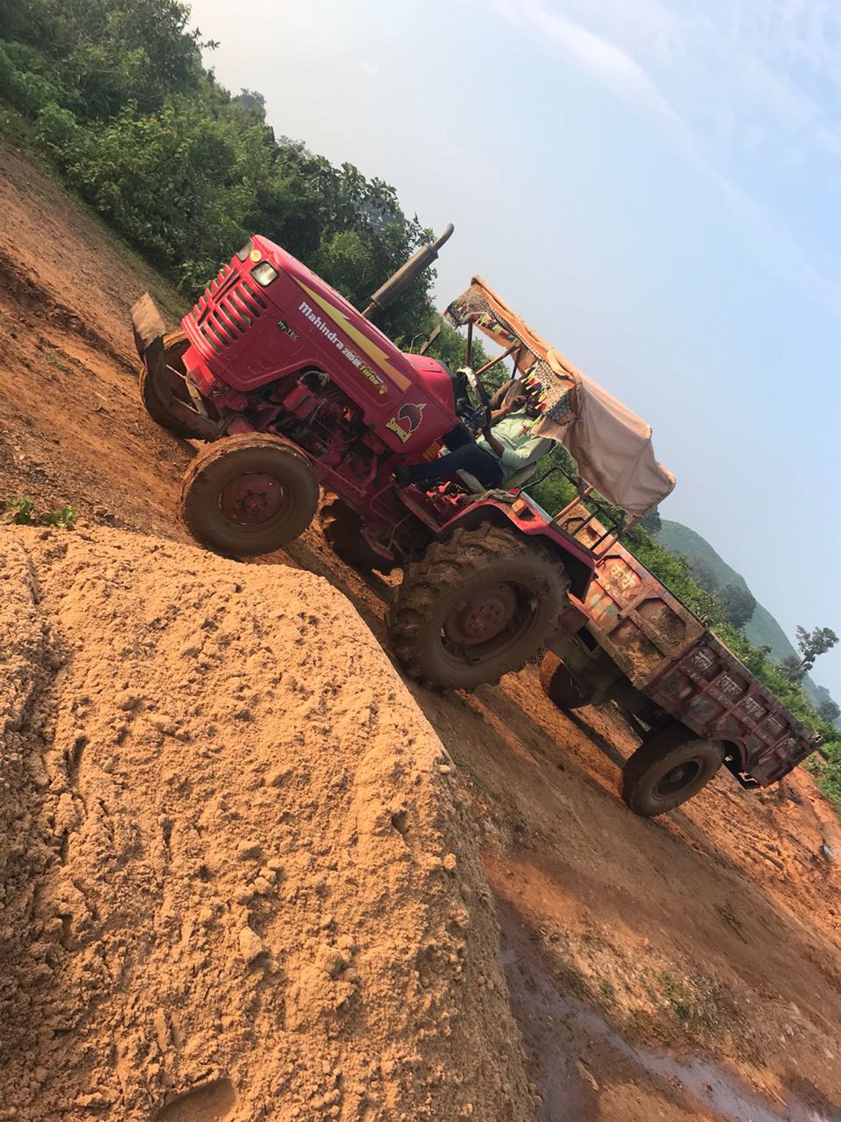 Seized tractors and trucks transporting illegal sand