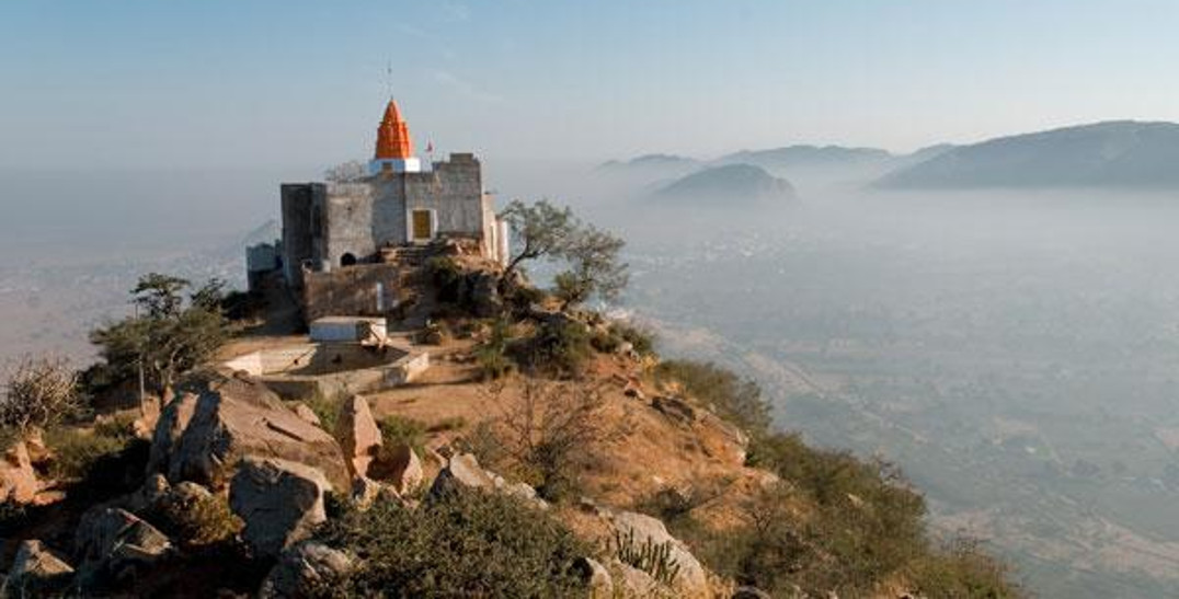 married ladies worshipping in savitri temple pushkar