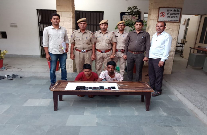 two persons arrest, 10 mobile recovered