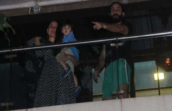 kareena kapoor with saif ali khna and taimur ali khan at home