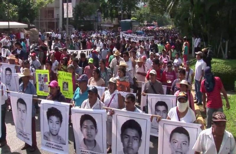 protest march in mexico city against abduction of 43 student