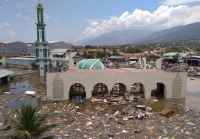 Indonesia people killed in earthquake tsunami to be buried collectively