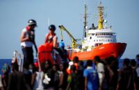 around 700 migrants rescued near spain port says govt official