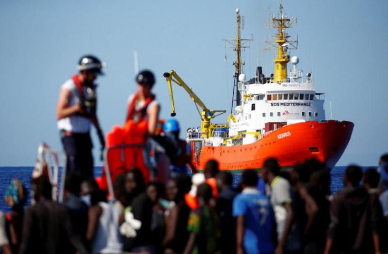 around 700 migrants rescued near spain port says govt official