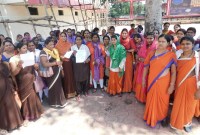 Asha Usha workers encircle the collector