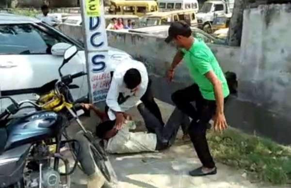 Beating in front of police station