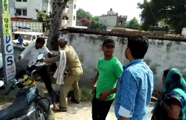 Beating in front of police station