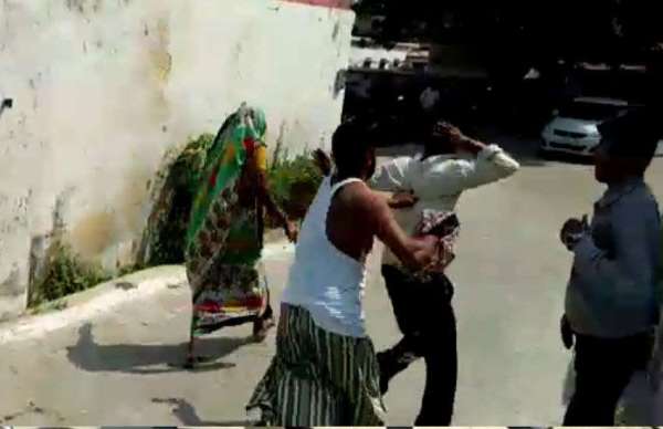 Beating in front of police station