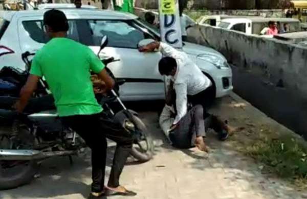 Beating in front of police station