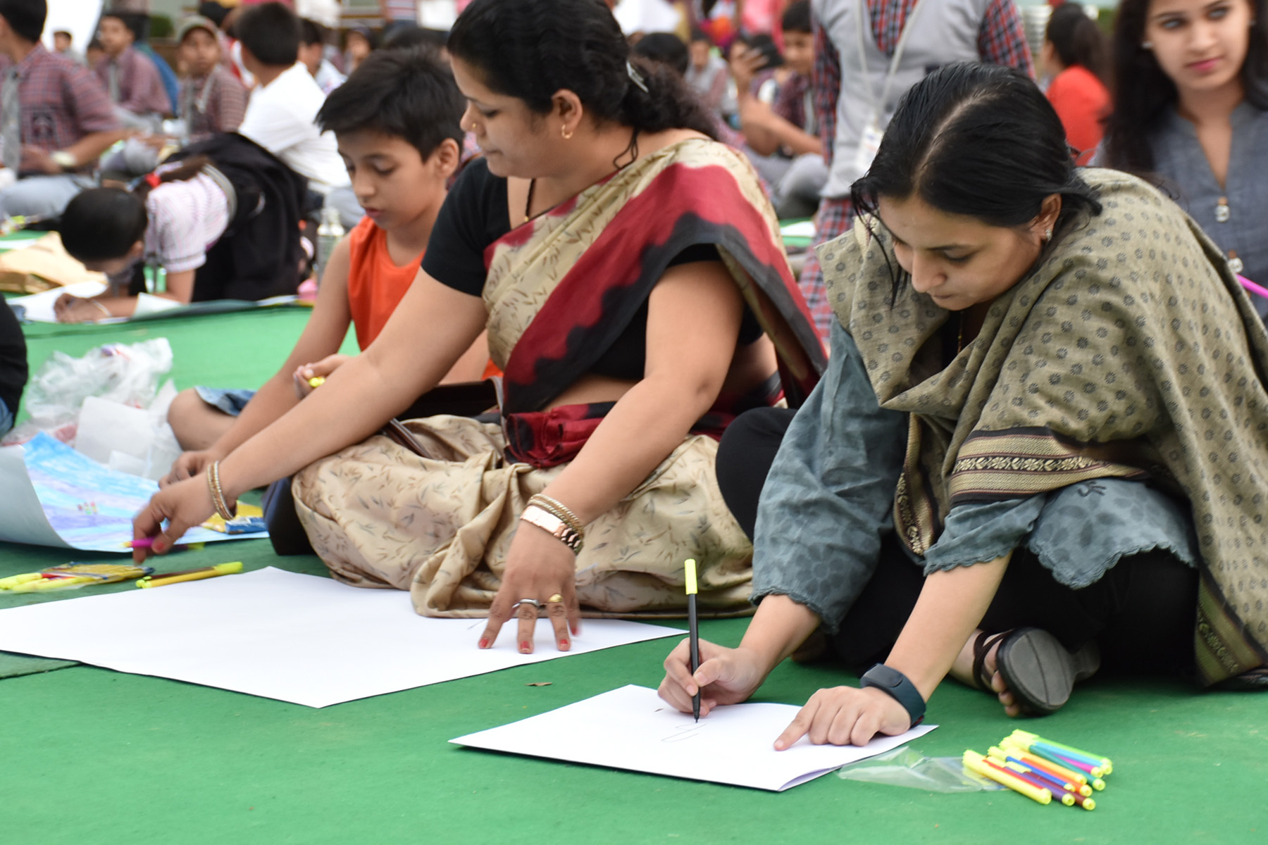 Assembly elections: Children on the poster motivated to color
