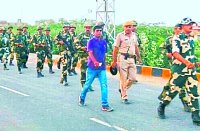 BSF, Police flag march
