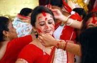 blessings given to each other well as the completion of the Durga Puja festival