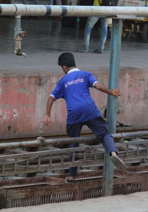 People crossing the tracks carelessly