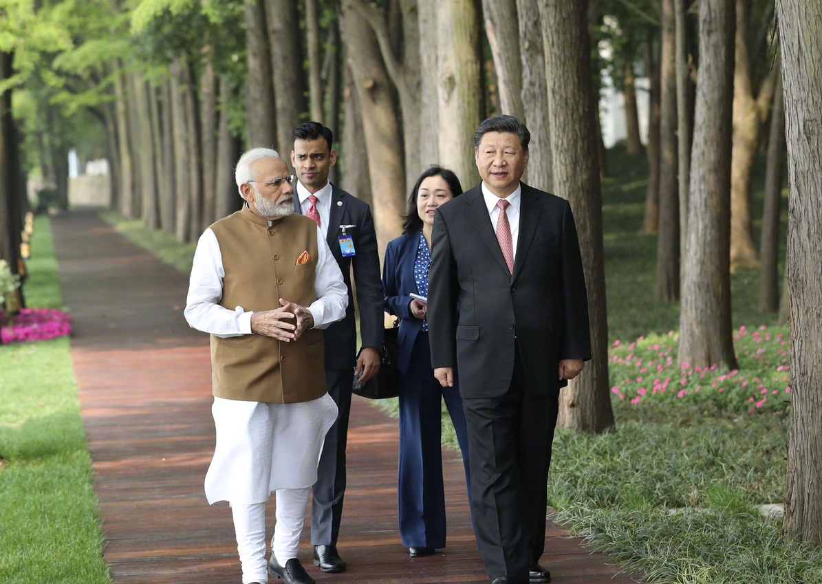 india, china., modi, shi jinping, trade talks, border tensions. 