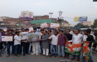 Youth Congress Protest march with parrot locked in cage On CBI case 