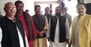 Pradeep of BJP riding on bicycle, joining SP