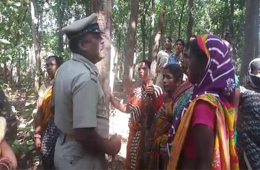 police and villagers 