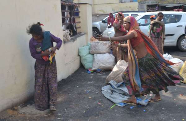 Two women fight for garbage